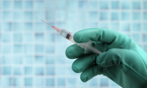 covid siringa guanto verde